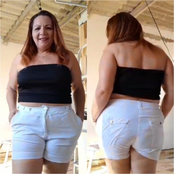 Eliane Sena de short jeans e tomara que caia cropped